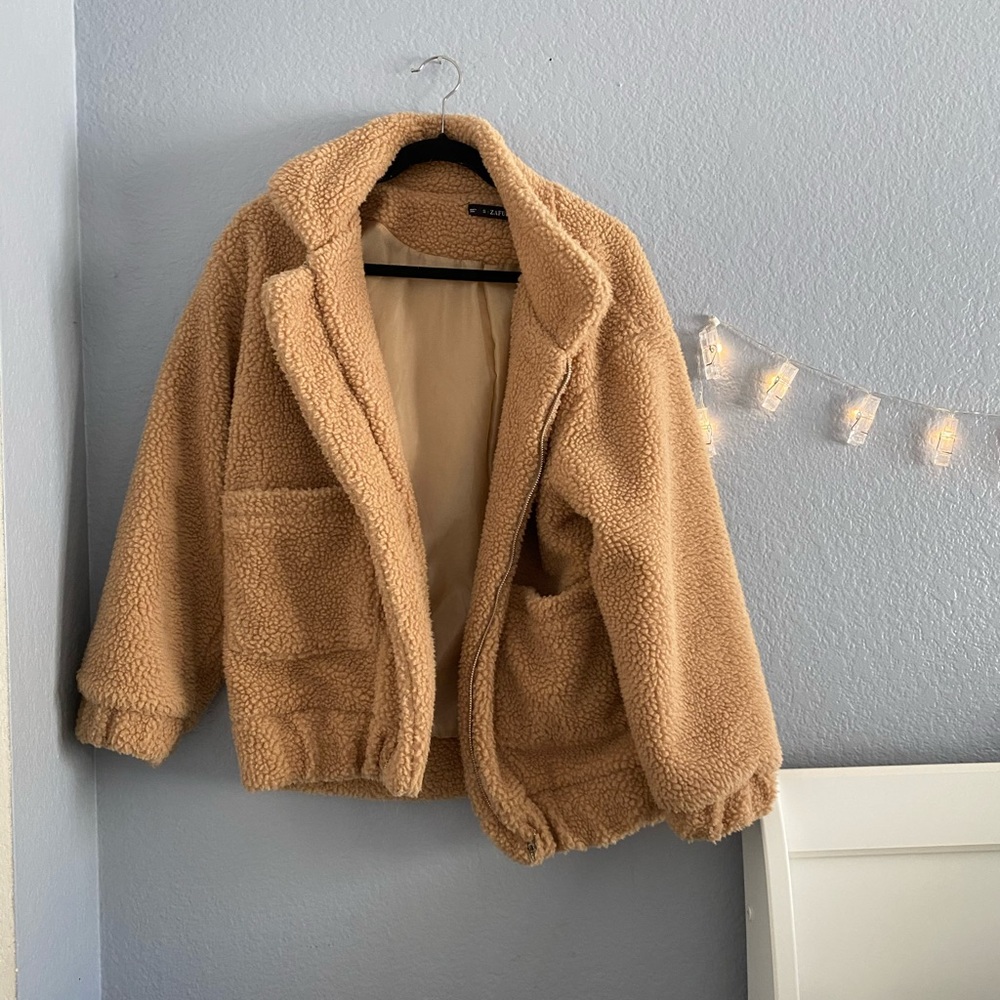 puffy brown jacket 🤙🏻